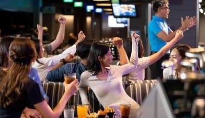 A table cheering each other on between games